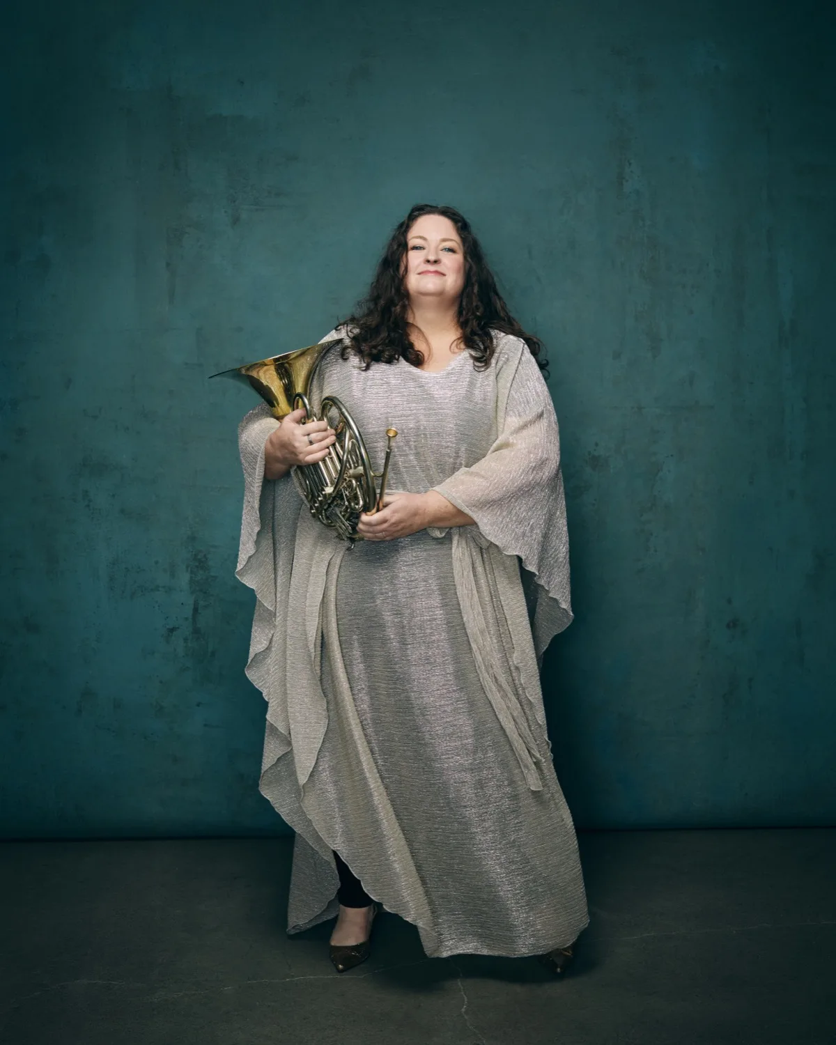Megan Cullen raising her horn